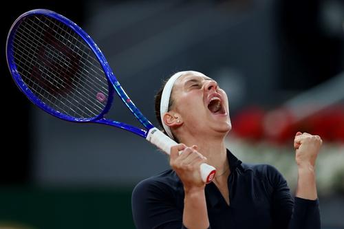 Marta Kostyuk sărbătorind calificarea în finala de la Madrid Foto: Guliver/GettyImages