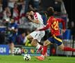 George Mikautadze (în duel cu Marc Cucurella) n-a putut rezista Spaniei în „optimea” de duminică (1-4) / Foto: Imago