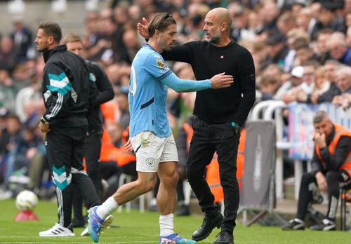 Jack Grealish și Pep Guardiola. Foto: Imago