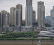 Din altă lume! Megaorașul din China despre care nu vorbește nimeni, dar e la nivel de Shanghai și Beijing » Stadionul se încadrează în peisajul futurist