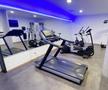Zona de fitness de la hotelul Melchior Park Würzburg