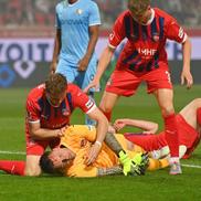 Portarul lui Heindenheim, Kevin Muller, inconștient după ciocnirea cu Ibrahima Sissoko în meciul cu Bochum / Foto: Imago