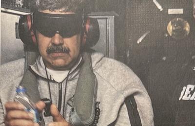 Trump a postat o imagine cu Maduro capturat