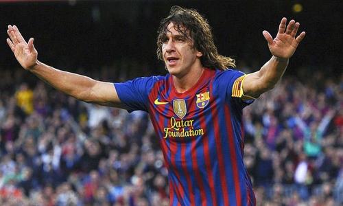 Carles Puyol (42 de ani)