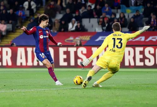 Joao Felix îl învinge pe Oblak // Foto: Imago
