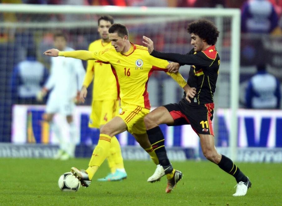 Florin Gardoș are în palmaresul ca „tricolor” o victorie contra Belgiei, scor 2-1, în amicalul disputat pe 14 noiembrie 2012, pe Arena Națională. Aici în duel cu Fellaini FOTO: GSP Răspuns direct al unui fost „tricolor” pentru trufașii belgieni: „Lukaku nu ne va face sandvici. Drăgușin știe cum să-l anihileze. Tocmai a făcut-o”
