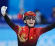 Wu Dajing (China), sărbătorind victoria în proba de mixt patinaj viteză