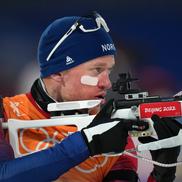 Tarjei Boe (Norvegia), concurând la proba de biatlon