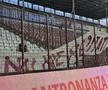 Mesajul apărut în locul galeriei Rapidului la meciul cu CFR Cluj, în timp ce Șucu își ocupa locul la „oficială”