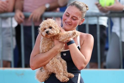 Marta Kostyuk, alături de câinele ei/Foto: Getty Images
