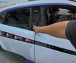 „Ferrari chinezesc” » Un vlogger român a ajuns din greșeală la prezentarea mașinii viitorului din China: IMAGINI