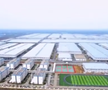 Se ridică mega-fabrica misterioasă a Chinei! O fortăreață mai mare decât orașul San Francisco: 1 milion de mașini, un stadion și un coșmar pentru Tesla
