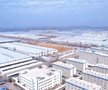 Se ridică mega-fabrica misterioasă a Chinei! O fortăreață mai mare decât orașul San Francisco: 1 milion de mașini, un stadion și un coșmar pentru Tesla