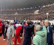 Un român din Brașov a participat la maratonul din Coreea de Nord » Peste 50.000 de oameni l-au așteptat disciplinați pe stadionul din Phenian