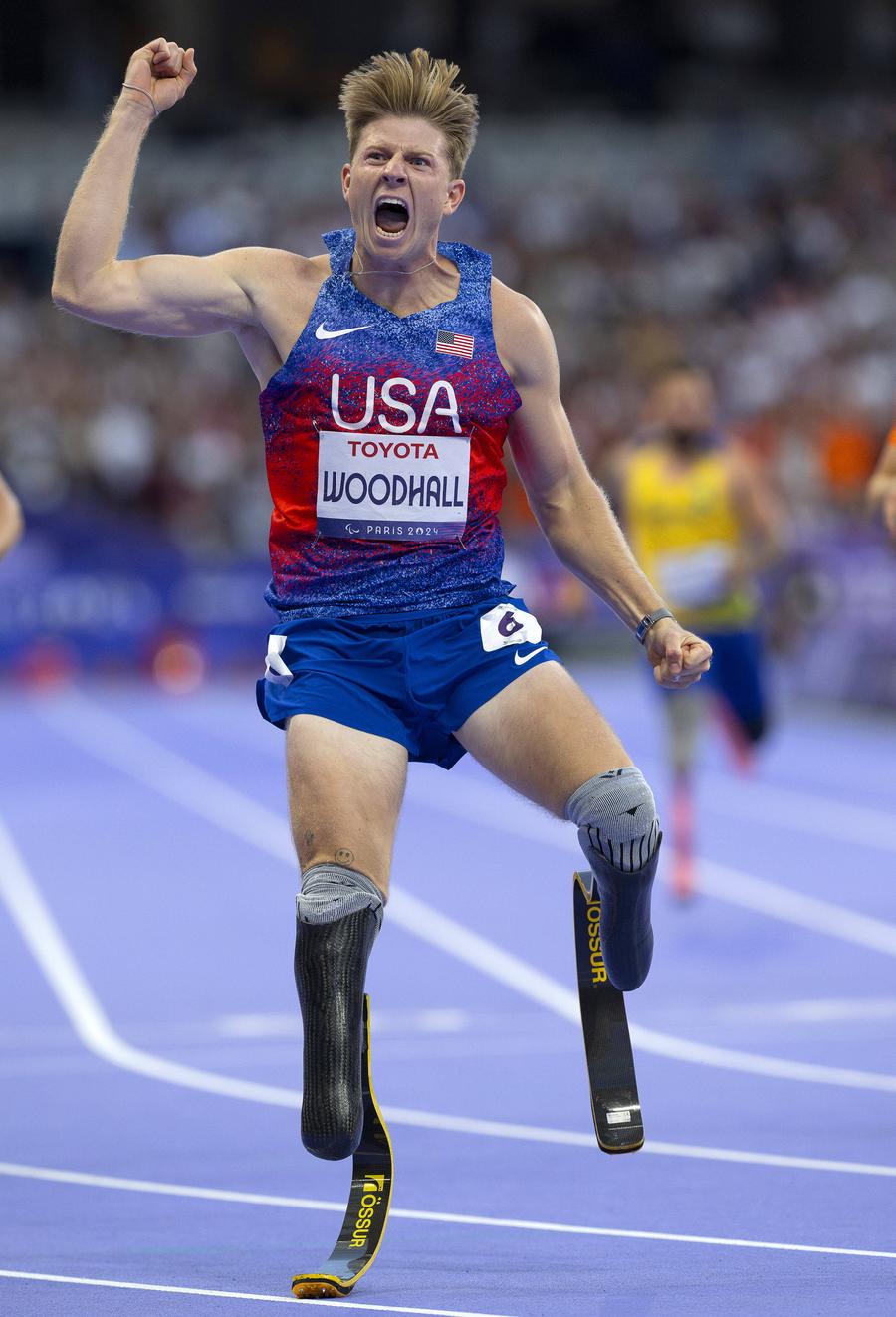 Hunter Woodhall FOTO Guliver/GettyImages Paris, orașul visurilor împlinite » Hunter Woodhall a devenit campion paralimpic după ce soția sa, Tara, cucerea aurul la Jocurile Olimpice în urmă cu o lună