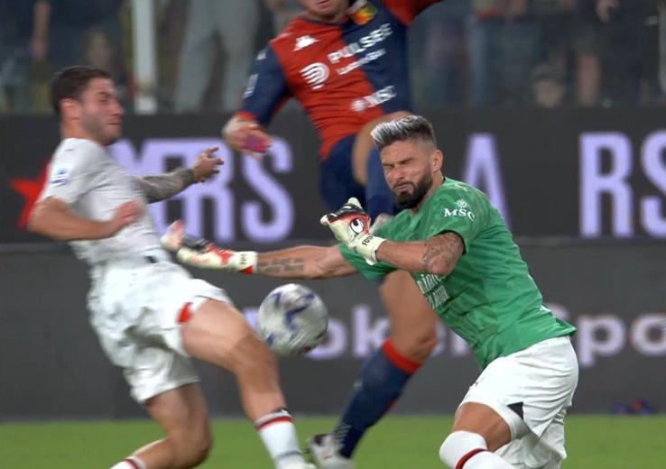 Giroud blocându-l pe Pușcaș