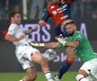 Giroud blocându-l pe Pușcaș