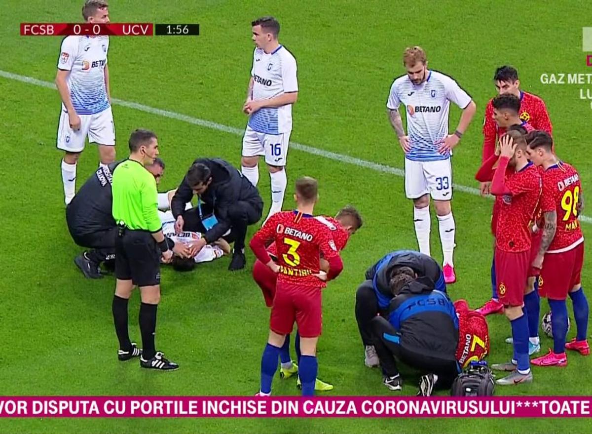 FCSB - CRAIOVA // FOTO Ciocnire groaznică, după două minute de la start: Darius Olaru, dus cu ambulanța la spital!