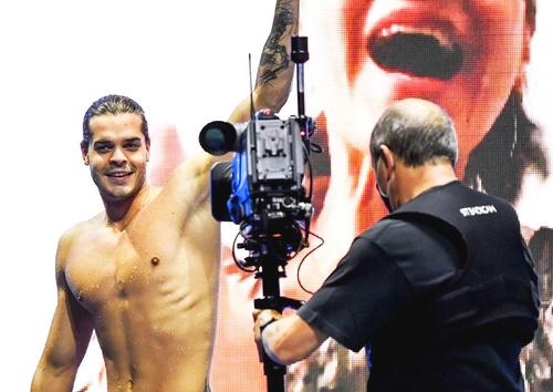 Robert Glință (24 de ani), campion european la natație în proba de 100 m spate, crede că Marian Drăgulescu (40 de ani) și Simona Halep (29 de ani) ar trebui să poarte drapelul României în festivitatea de deschidere de la Jocurile Olimpice.