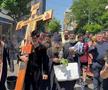 Gigi Becali a ieșit pe Calea Victoriei să „curețe” cu agheasmă după marșul LGBT: a purtat o cruce uriașă, apoi s-a oprit și a cântat