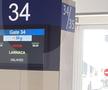 Imaginile de pe aeroportul Otopeni, după ce zborul spre Larnaca a fost amânt ore în șir
