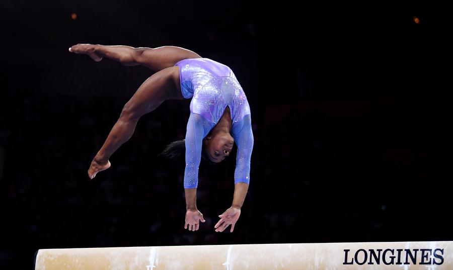 Simone Biles în acțiune la CM 2019 FOTO Guliver/GettyImages Competiție anulată la Tokyo » Ce se întâmplă cu Jocurile Olimpice?
