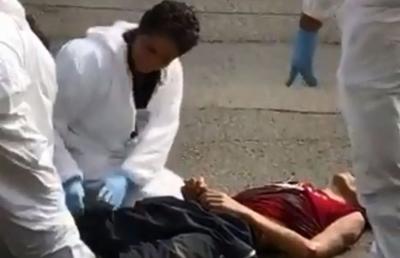 ATENȚIE IMAGINI VIOLENTE » Trei fani din Columbia au ucis un suporter rival în plină stradă! Unul dintre atacatori era minor