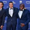 Kylian Mbappe, în centru, alături de fratele Ethan (stânga) și de tatăl Wilfried / Foto: Imago