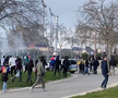 Bătaie ca în filme înainte de Barcelona - Benfica » Fanii și-au împărțit pumni în fața stadionului