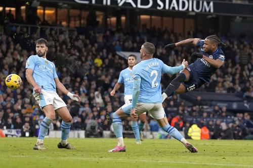 Christopher Nkunku (dreapta), contra lui Manchester City / Foto:  Imago Images