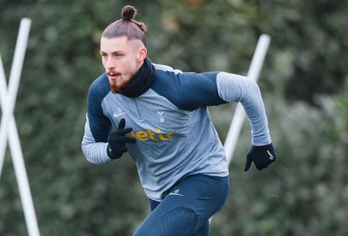 Radu Drăgușin, vineri, la primul antrenament în treningul lui Tottenham