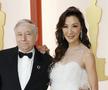 Fostul mare boss de la Ferrari, Jean Todt, alături de premiata serii, Michelle Yeoh
