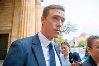 Rohan Dennis s-a prezentat în faţa instanţei, după ce a fost trimis în judecată pentru moartea soţiei lui