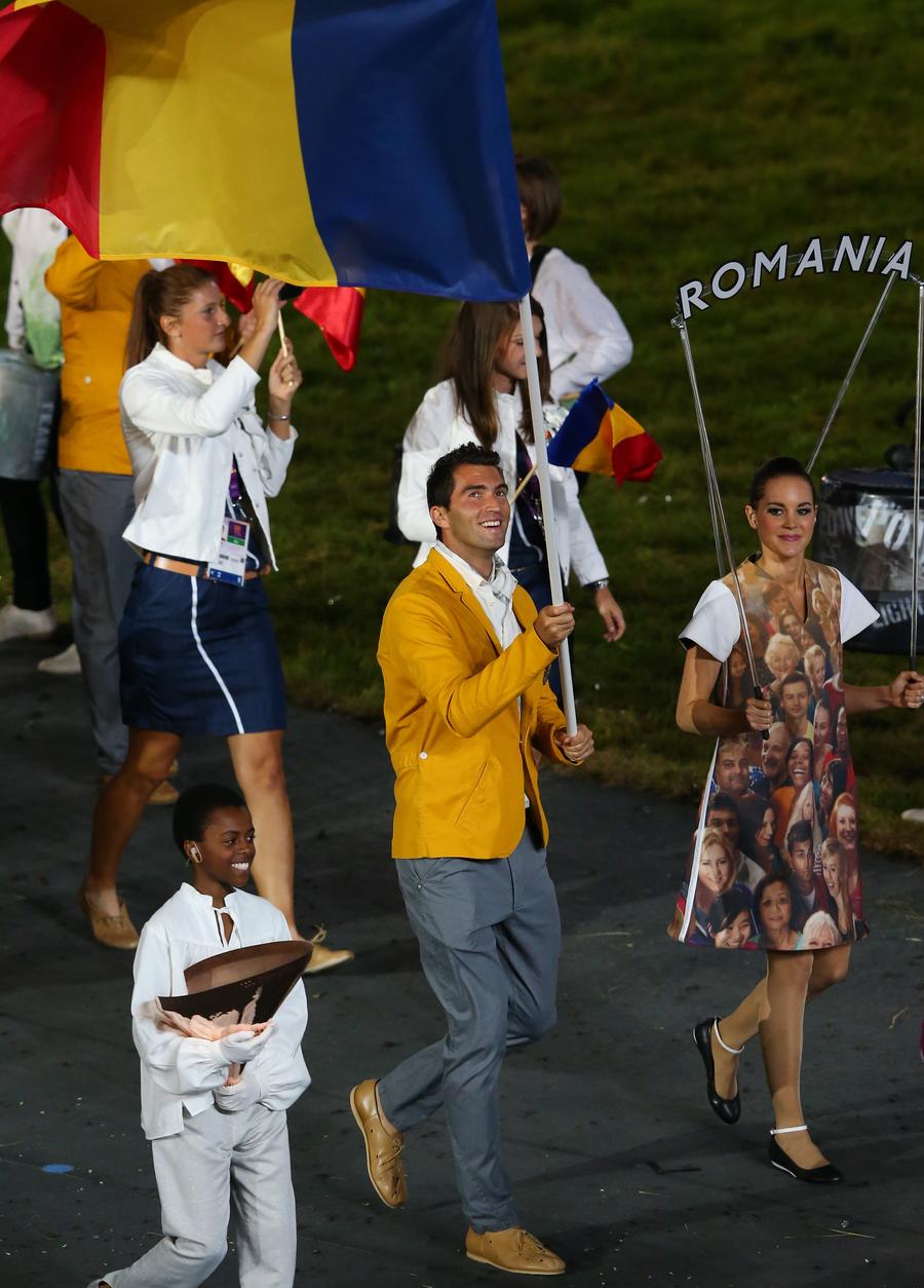 Horia Tecău privind mândru spre drapel la Londra 2012 FOTO Guliver/GettyImages Se caută portdrapel! » Cu 100 de zile înainte de ceremonia de deschidere a JO, încă nu se știe cine va purta tricolorul la Tokyo