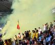 Fumigene aprinse de ultrașii de la Uniți sub tricolor la meciul Spania - România, de la Euro U21. Foto: Ionuț Iordache (GSP.RO)