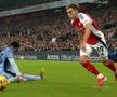 Fază uluitoare în Arsenal - Tottenham: l-a accidentat din dribling pe colegul lui Drăgușin!