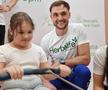 Ciprian Tudosă - Canotorii lotului național alături de copii de la Asociația „Ana și Copiii” Foto: FR Canotaj
