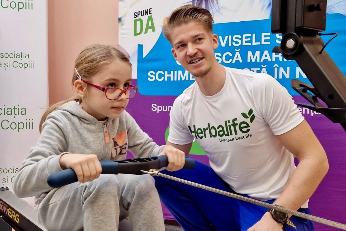 Canotorii lotului național, alături de copiii defavorizați: „Sunt foarte entuziasmați și știau despre ce e vorba, știau mișcarea”