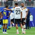 Nemții Felix Nmecha și Jonathan Tah vorbesc cu adversarii din Curacao / Foto: Imago