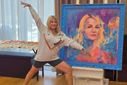 Încântată de tabloul primit, Nadia a făcut și o figură din gimnastică