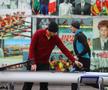 Sergiu Bejan, campion european și mondial, întinde ruleta pe barcă, în spate fiind fotografiile altor campioni și campioane din diverse generații FOTO Dumitru Angelescu