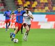 Andrei Borza, eliminat de Horațiu Feșnic în FCSB - Rapid // FOTO: Cristi Preda (GSP.RO)
