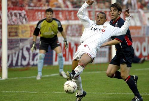 Dario Silva (echipament alb), în tricoul lui FC Sevilla / Foto: GettyImages