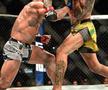 Charles Oliveira, noul campion din UFC! KO violent în meciul cu Chandler pentru centura eliberată de Nurmagomedov