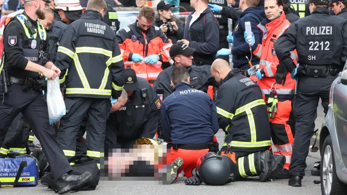 Incident major la Hamburg! A încercat să atace fanii cu un topor și a fost împușcat de Poliție, înainte de Polonia - Olanda. Atenție, imagini șocante!