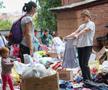Oamenii evacuați din Kursk, la coadă pentru a primi ajutoare umanitare / Sursă foto: Imago Images