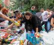 Oamenii evacuați din Kursk, la coadă pentru a primi ajutoare umanitare / Sursă foto: Imago Images