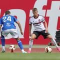 Alexandru Ișfan (stânga) a debutat pentru Real Oviedo // FOTO: Imago Images