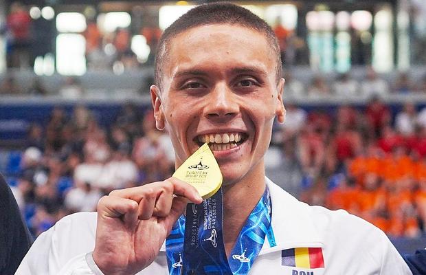 Au ieșit la atac: „David Popovici câștigă aur în 2026, ANS nu a plătit premii restante din 2024!” + Replica șefului sportului: „Condamnat penal pentru delapidare”