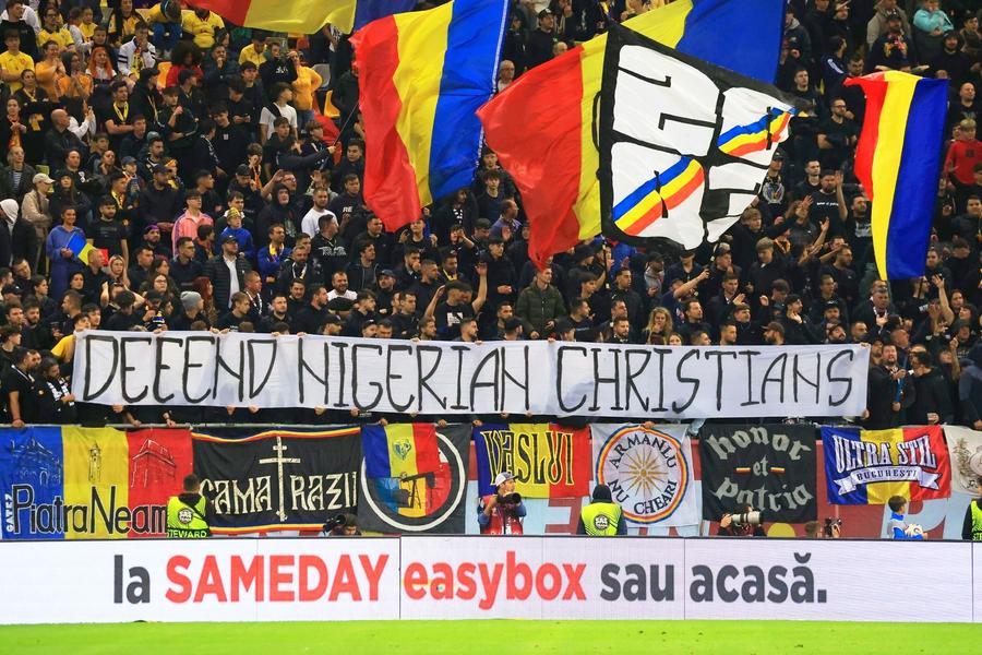 „Apărați creștinii din Nigeria” » Ce înseamnă bannerul neașteptat afișat de galeria României, foto: Cristi Preda / GSP „Apărați creștinii din Nigeria” » Ce înseamnă bannerul neașteptat afișat de galeria României la meciul cu Austria: „Sunt 19.000 de biserici distruse”